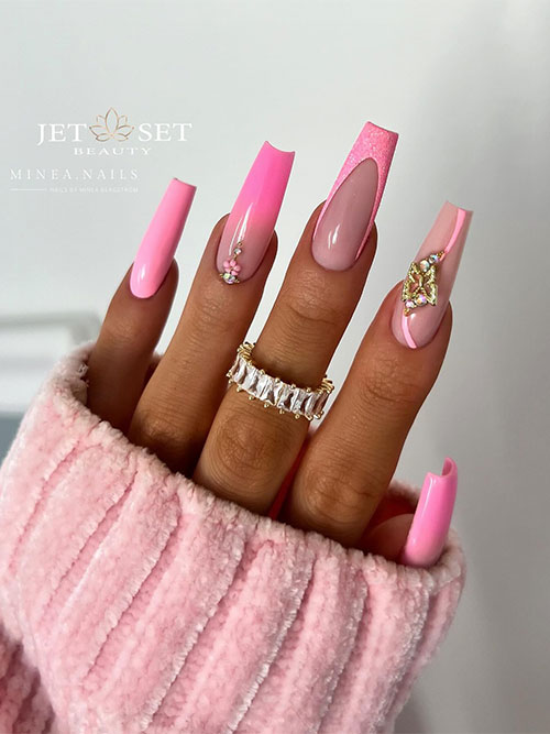 Cute coffin Barbie pink nails with a French ombre accent nail, a glitter French tip, and a swirl accent nail with rhinestones