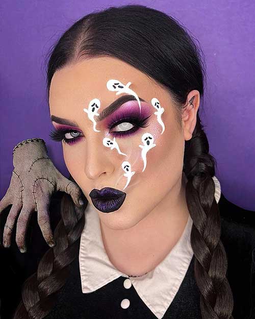 Simple ghost makeup showcasing white ghosts over half the face, spooky eye contact, smoky purple eyes, and dark purple lips.