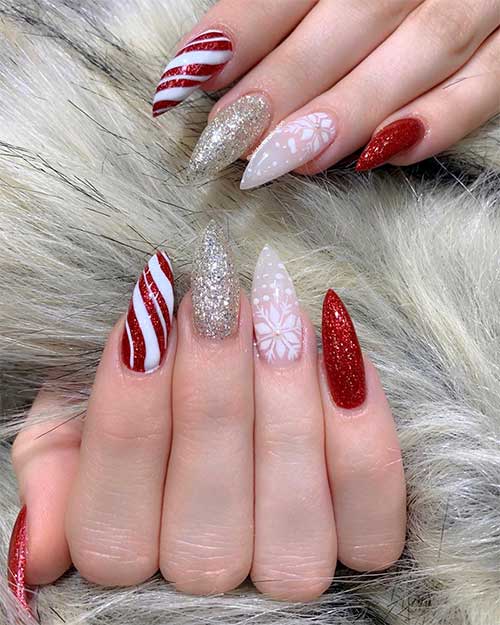 Cute red and white Christmas nails stiletto shaped design!