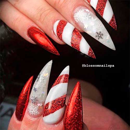 Cute red glitter Christmas stiletto nails set with candy cane and snowflakes nails!