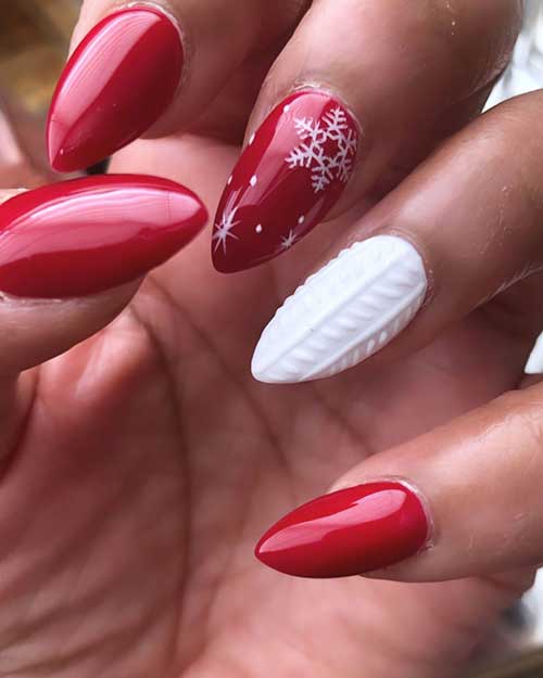 Gorgeous red Christmas nails set with snowflake nail and an accent white nail!