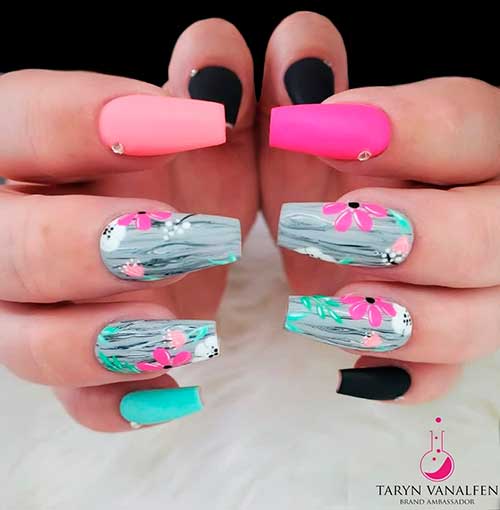 Cute multicolor spring nails with two accent floral coffin nails design!