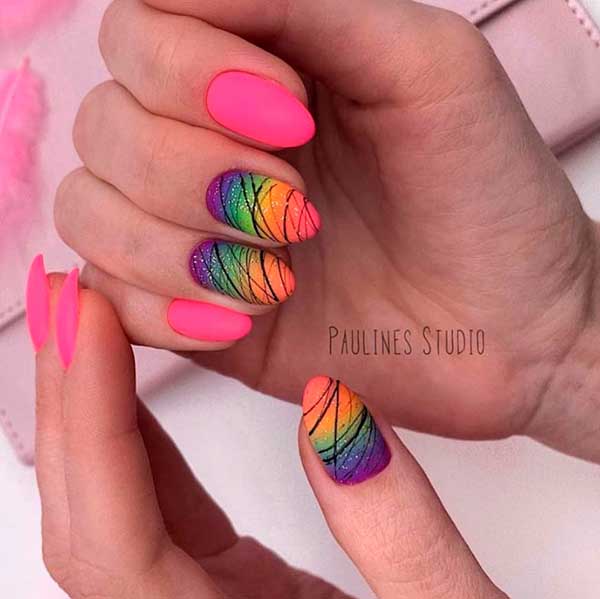 Gorgeous bright pink almond nails with colorful almond nails paired with some fine black lines for spring 2020 nail ideas
