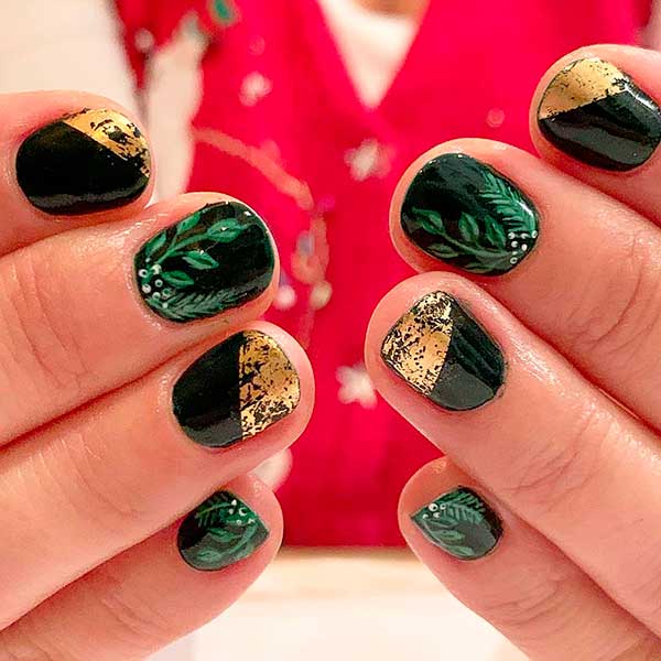 cute black short nails for spring 2020 with green leaves and gold foil on two accent nails
