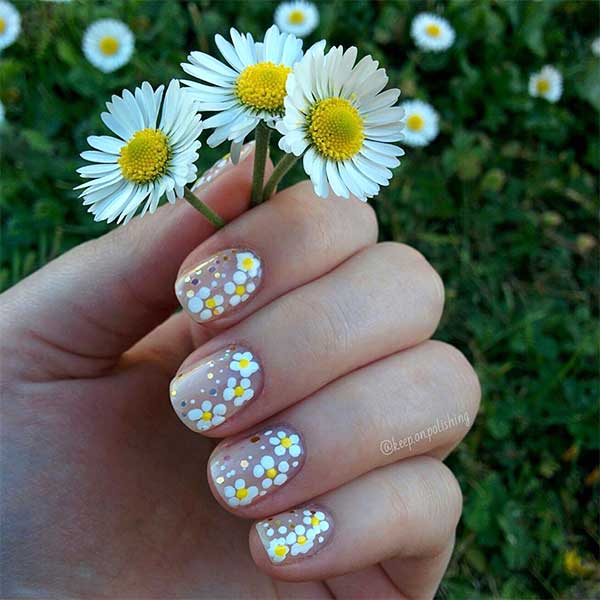 Cute nude short spring nails 2020 with white flowers and glitter design