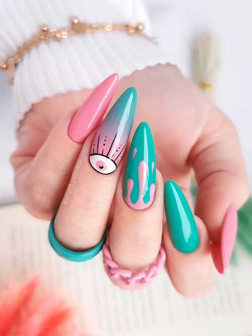 Long almond-shaped green-blue and pink spring nail design with drip nail art and eye nail art