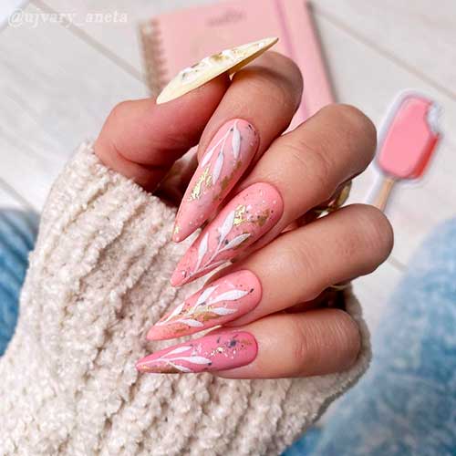 Light pink nails with gold glitter on leaf nail art and with accent light yellow nail!