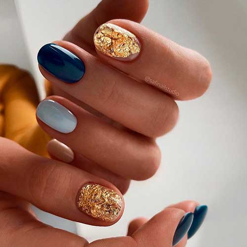 Short Round Shaped Multicolored New Years Nails 2022 Design