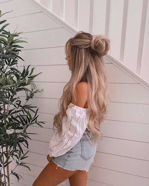 Half up bun half down long hairstyle for prom