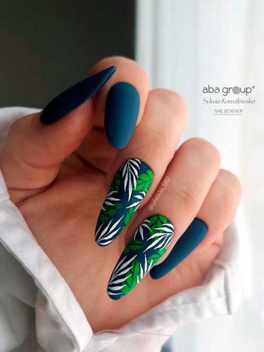 The Best Navy Blue Nails For 2023 Stylish Belles   Matte Navy Blue Nails With Leaf Nail Art 375x500 