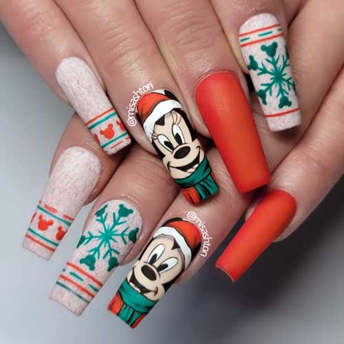 Long coffin-shaped matte Disney Christmas nails with ugly sweater designs, Mickey and Minnie accents, and a red accent nail.