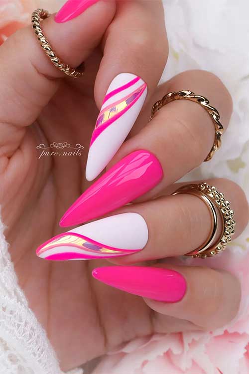 Long almond shaped hot pink nails with swirls on two off-white accent nails with gold chrome between swirls