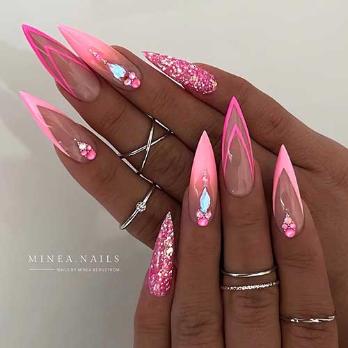 Long stiletto Barbie nails with hot and light pink hues. glitter, ombre, rhinestones, and French tips