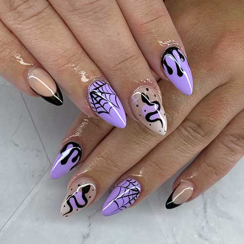 Medium almond-shaped purple Halloween nails featuring black blood drips, cobwebs, snake designs, and a black French accent nail.