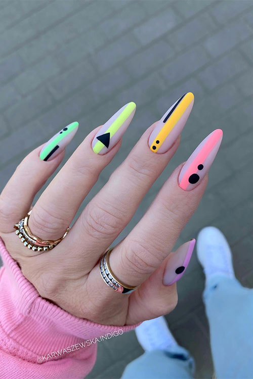 Long almond-shaped nude nails with matte colorful line nail art designs and black geometric nail art designs