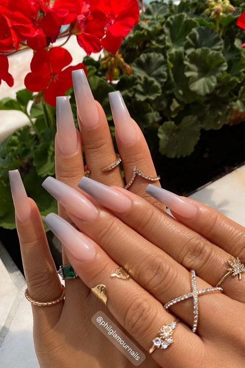 Long coffin-shaped nude to light gray ombre nails