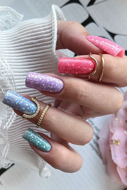 Multicolored confetti summer nails feature pink, hot coral, lilac, blue, mint confetti nail colors