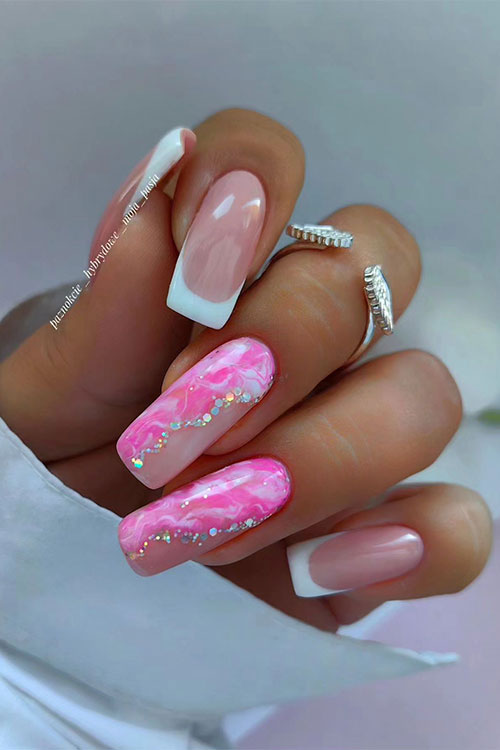 White French summer nails inspo with two nude accent nails adorned with neon pink and white marble nail art