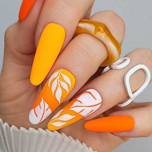 Light and Dark Neon Nails with White Leaf Nail Art