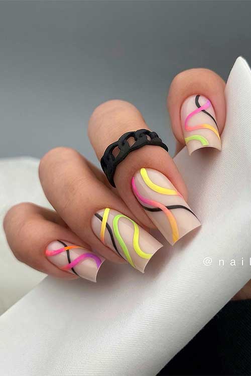 Multicolored neon swirls nails that feature long square-shaped nude nails with neon swirls