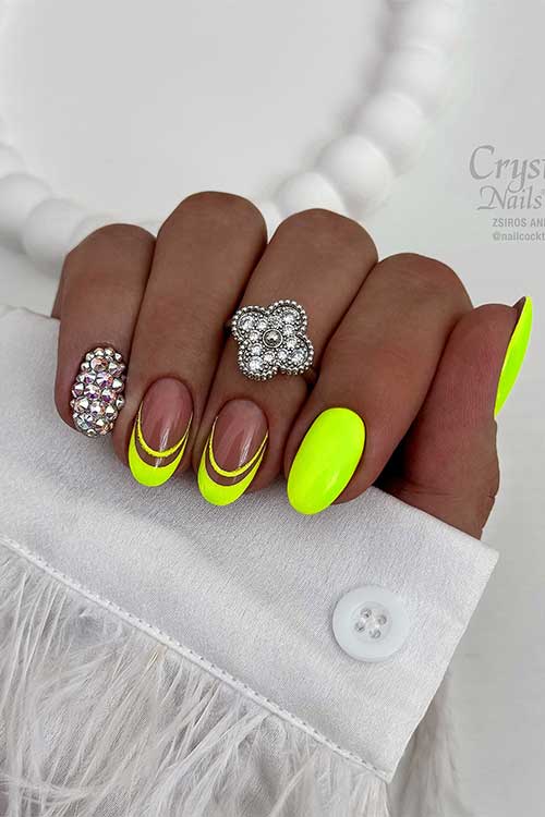 Short Neon Yellow Nails with French Tip Accent Nails and Silver Rhinestones on the Pinky Nail