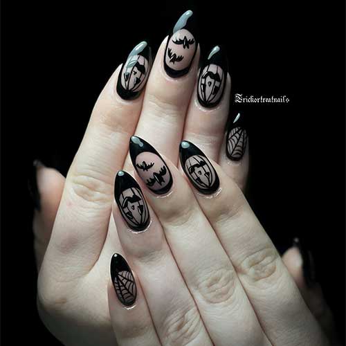 Creepy Halloween French nails featuring intricate designs of pumpkins, bats, and spider webs for a festive look.