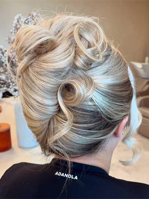 Elegant French twist hairstyle showcasing a sophisticated updo, perfect for formal occasions and enhancing facial features.