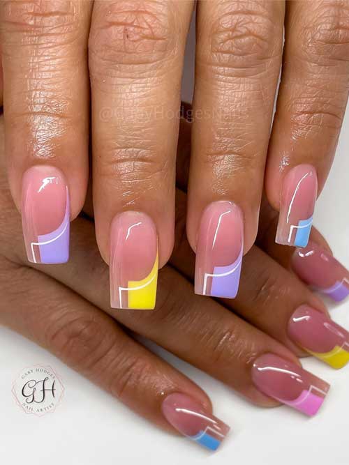 Colorful pastel nail art with geometric tips in purple, yellow, pink, and blue, enhanced by elegant white lines.